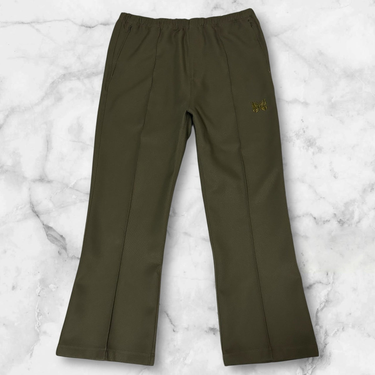 NEEDLES WARM UP PANTS OLIVE